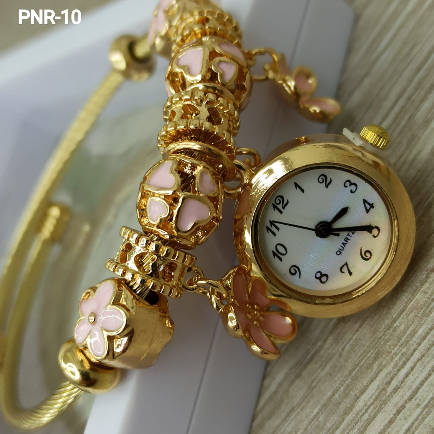 PNR RELOJ PULSERA TIPO PANDORA DORADO