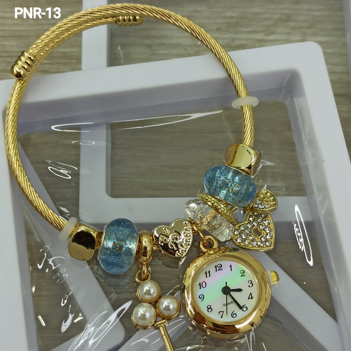 PNR RELOJ PULSERA TIPO PANDORA DORADO