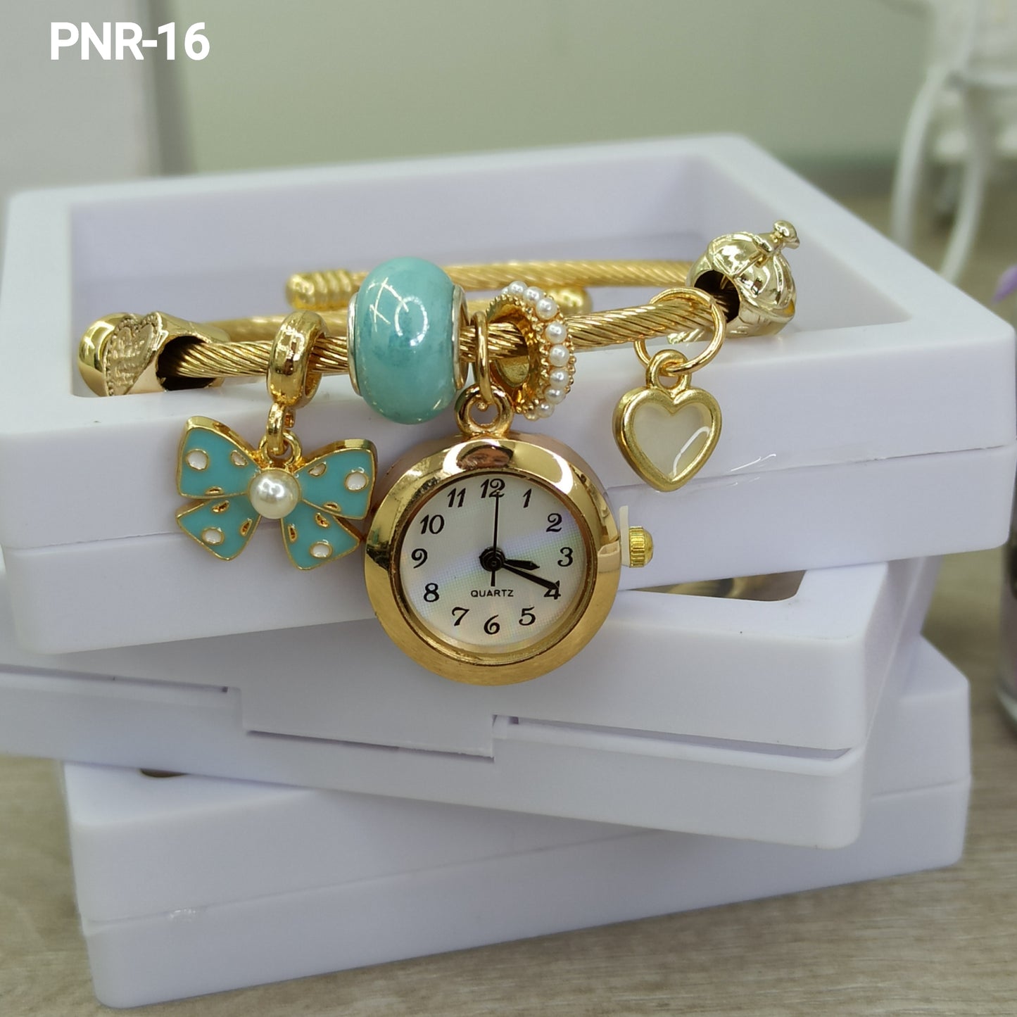 PNR RELOJ PULSERA TIPO PANDORA DORADO