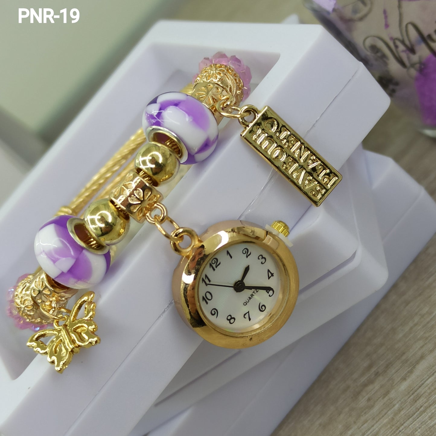 PNR RELOJ PULSERA TIPO PANDORA DORADO