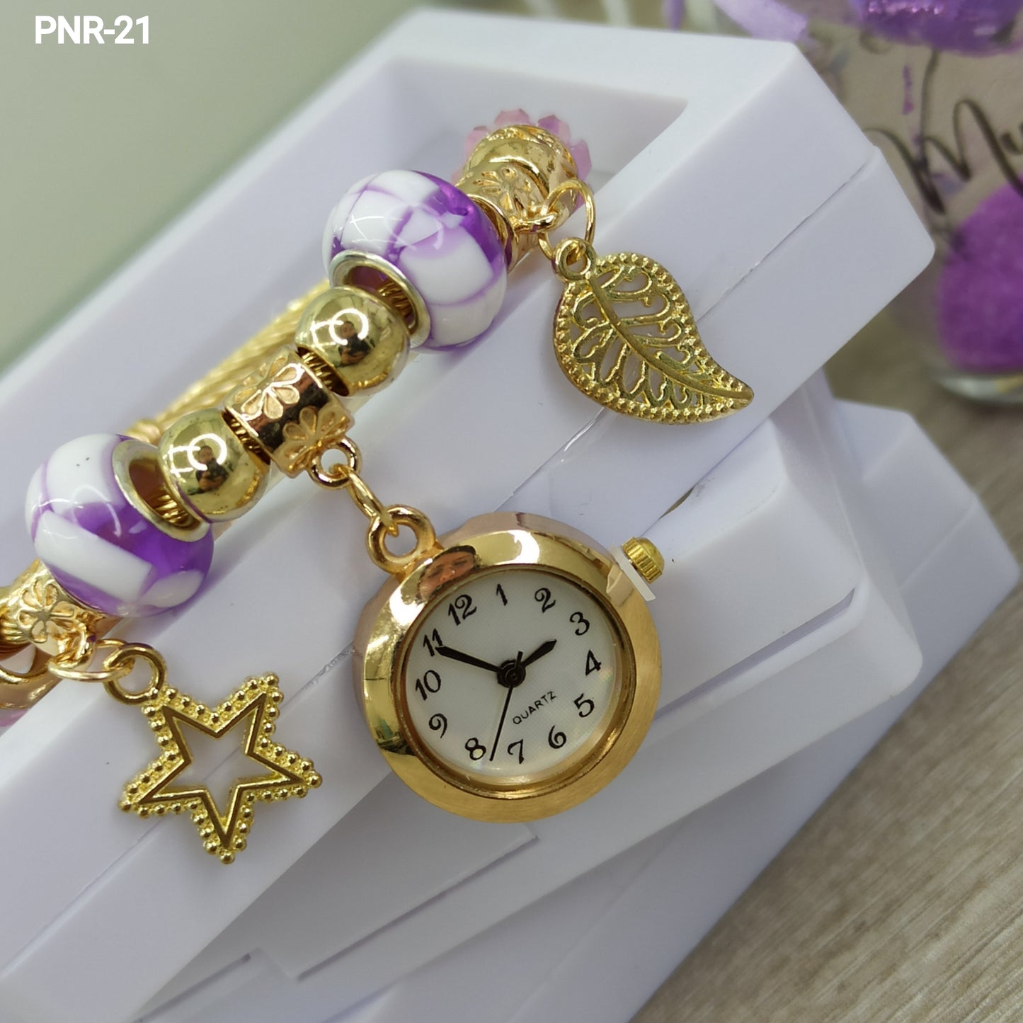 PNR RELOJ PULSERA TIPO PANDORA DORADO