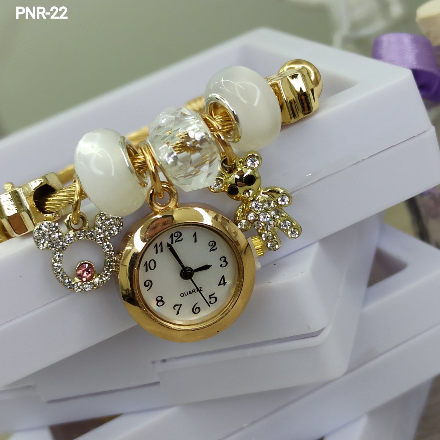 PNR RELOJ PULSERA TIPO PANDORA DORADO