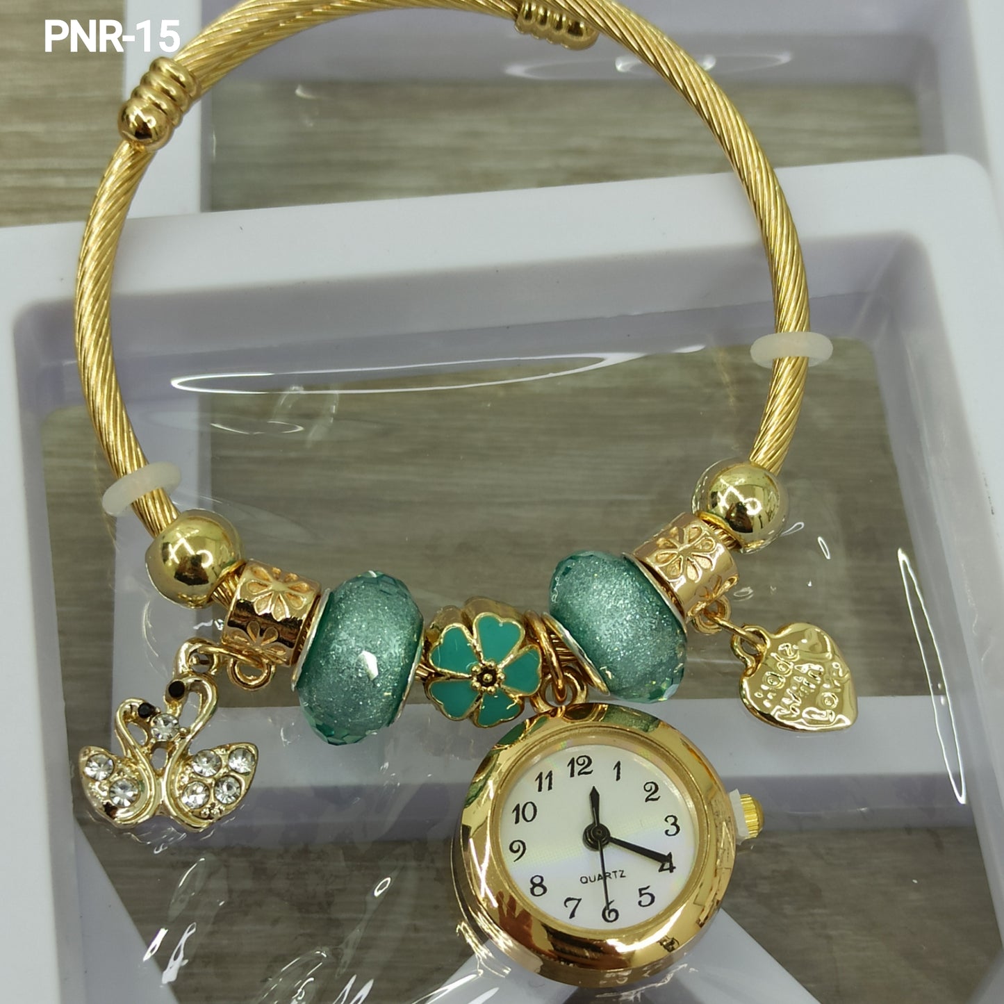 PNR RELOJ PULSERA TIPO PANDORA DORADO