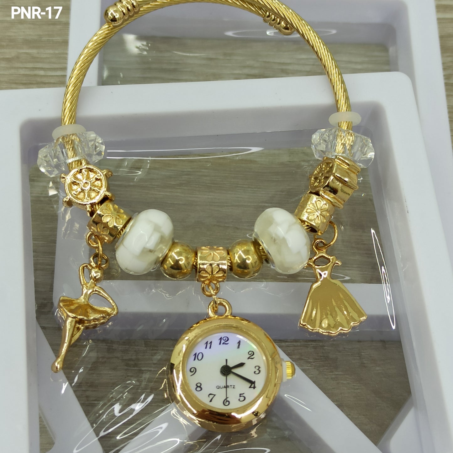 PNR RELOJ PULSERA TIPO PANDORA DORADO