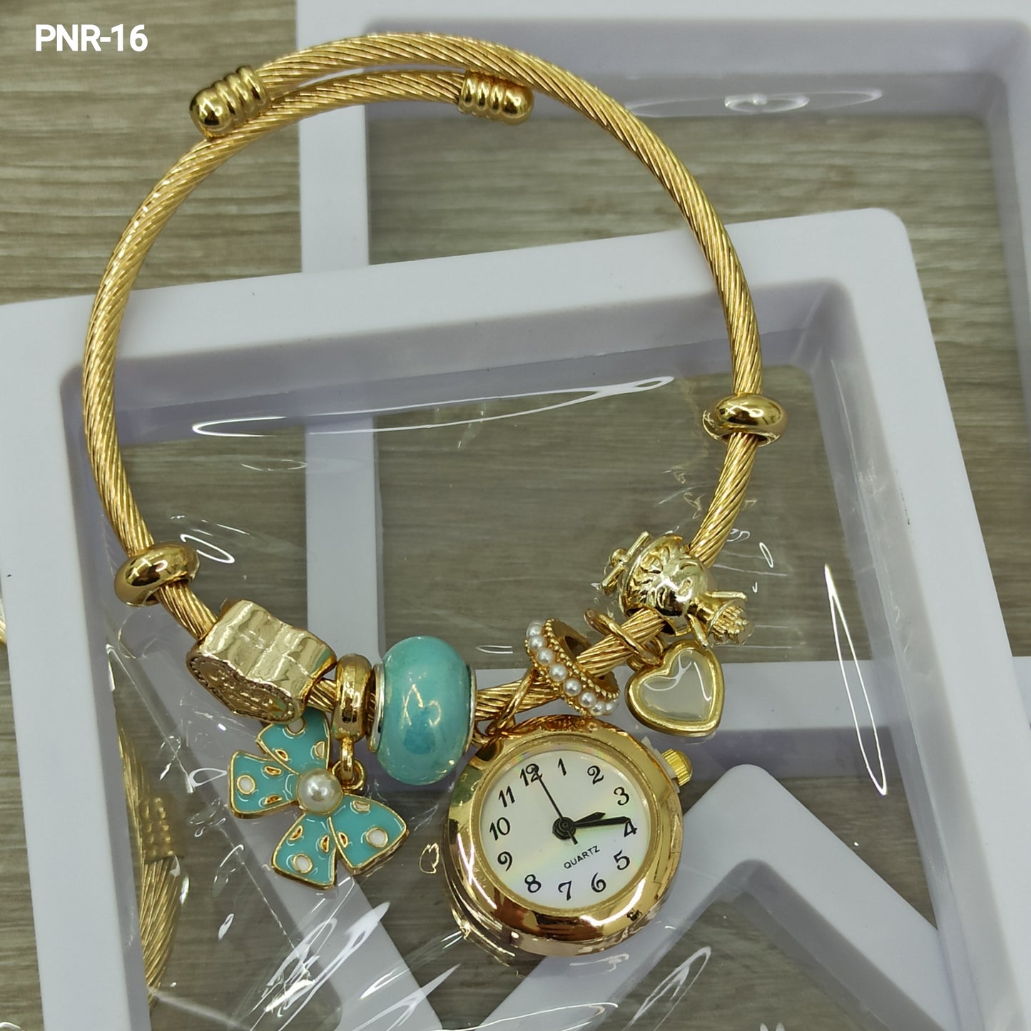 PNR RELOJ PULSERA TIPO PANDORA DORADO