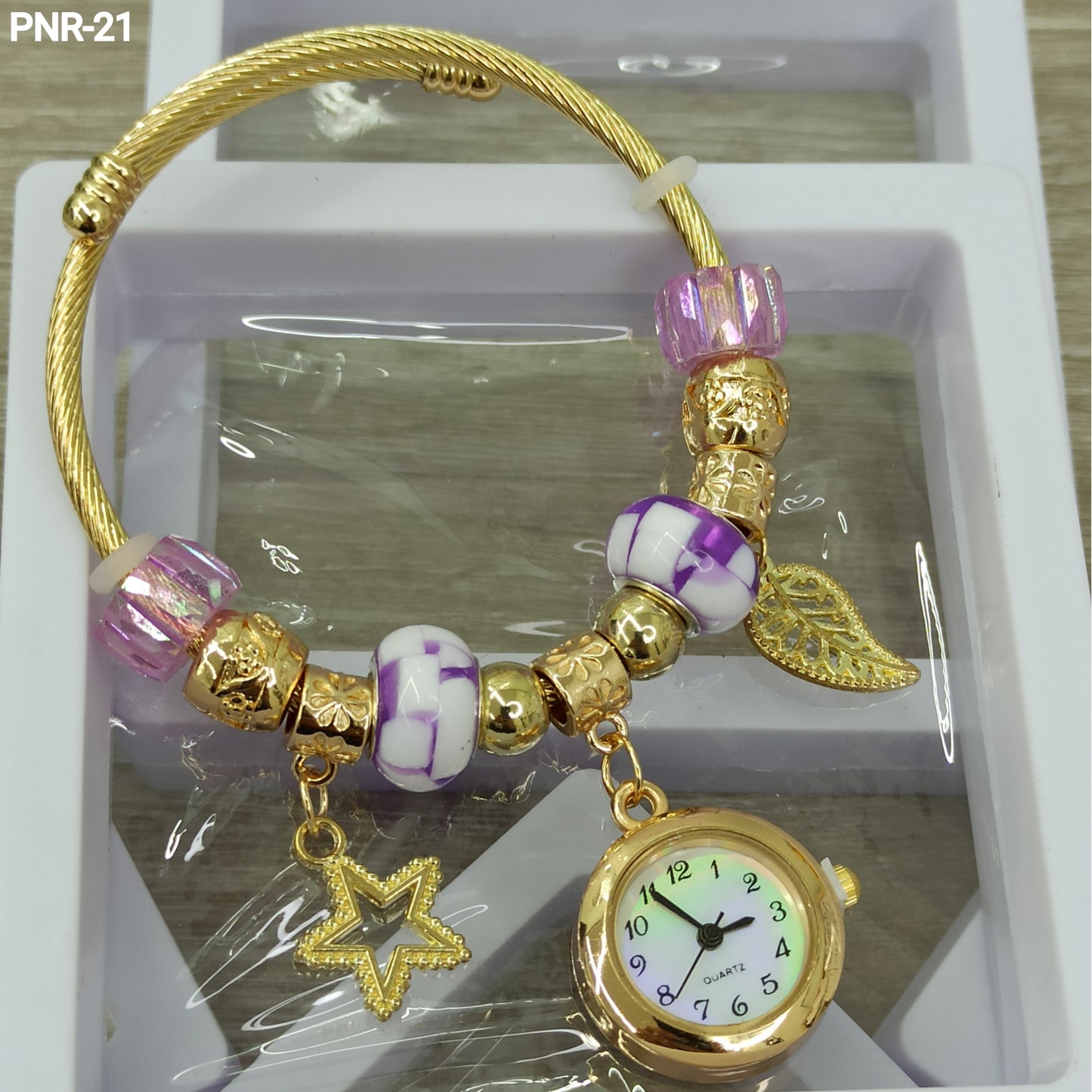 PNR RELOJ PULSERA TIPO PANDORA DORADO